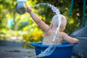 Child playing in water