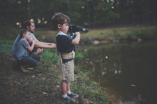 Dad and sons fishing