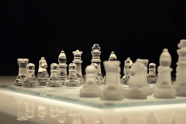 Clear chess set on board