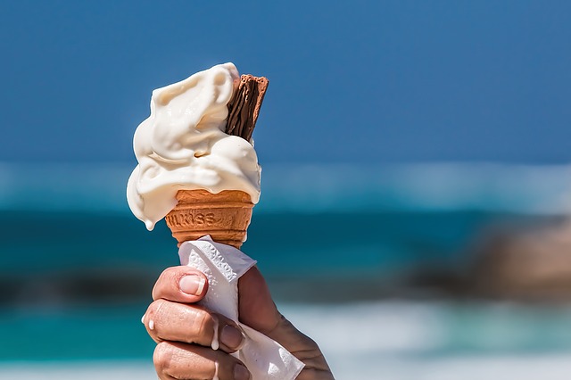 Person holding up ice cream cone