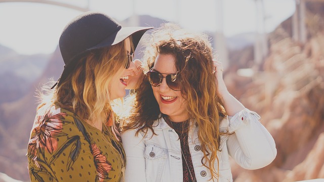 Two women laughing together