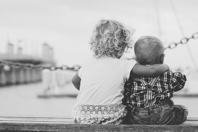 Toddlers sitting together